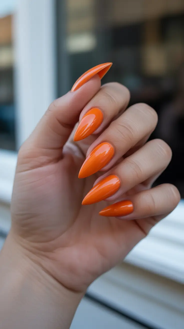 must-try spring nail colors 2026 Electric Tangerine Glow
